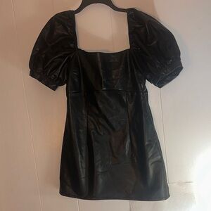 This is a black faux-leather puff-sleeve mini dress by H&M Divided. Like New , M